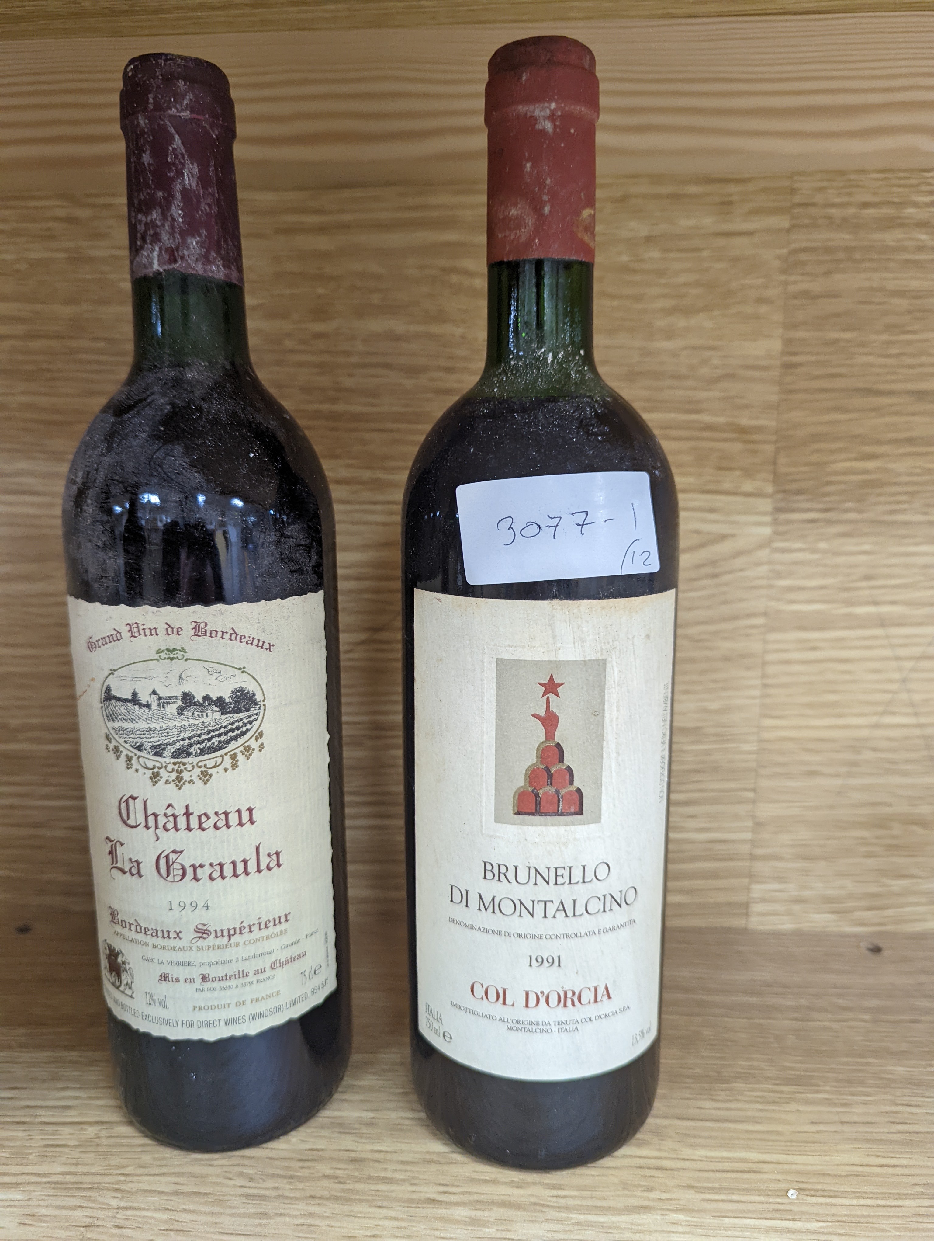Twelve assorted bottles of wine including one Opus One, 1988, one Vosne Romanee, Jean Paul Selles, 1992, one Chateau Cazauviel, Margaux 1993, Chateau Pontet-Canet, 1986 and Brunello Montalcino, 1985 & 1991 etc.